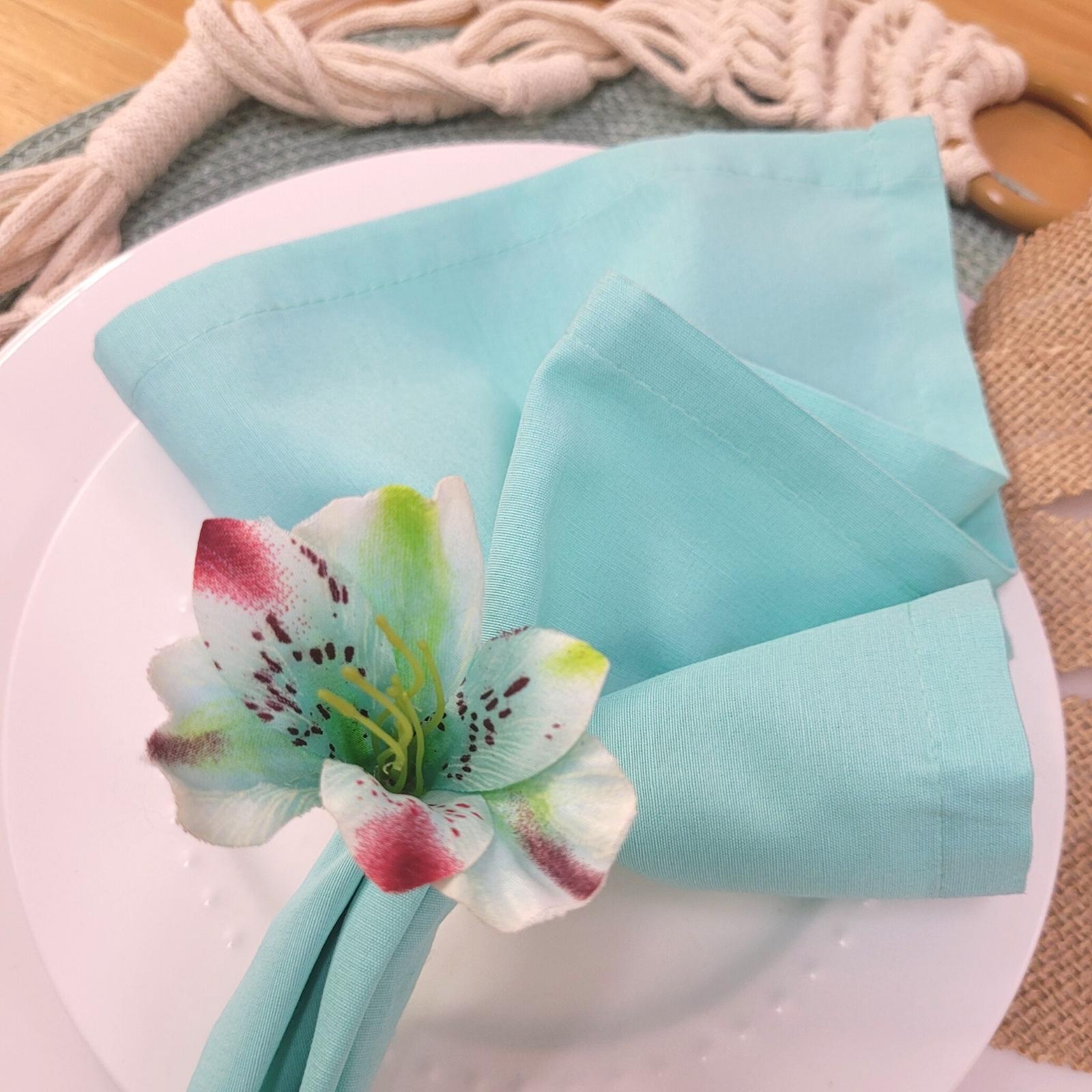 Maison Charlô | Wholesale Set of 20 Turquoise Small Astromelia Napkin Rings for event, restaurant, market
